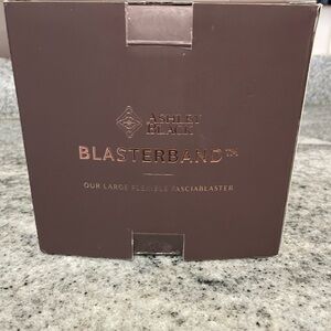 Like New Ashley Black Blasterband in box.